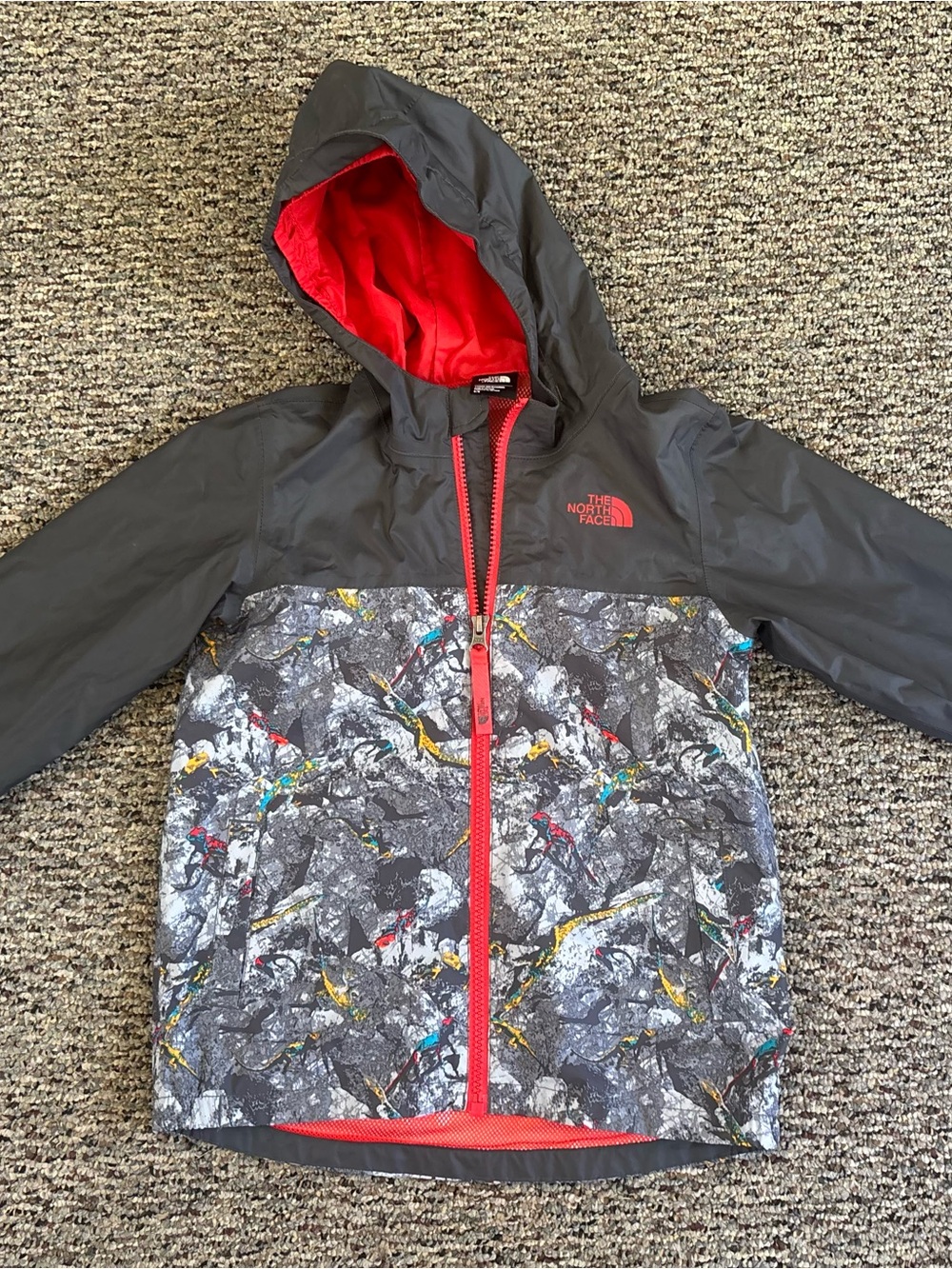 The North Face Kids Zip line Black & Red Hooded Rain Jacket with Dino pattern